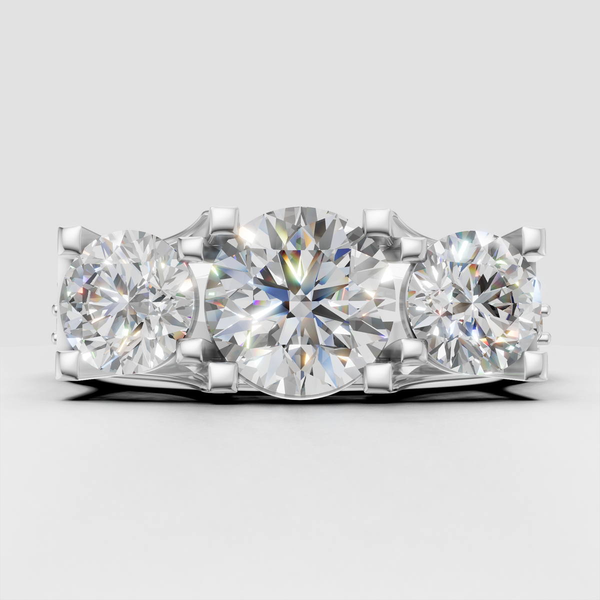 Luxury yellow gold three-stone engagement ring with round Diamond center