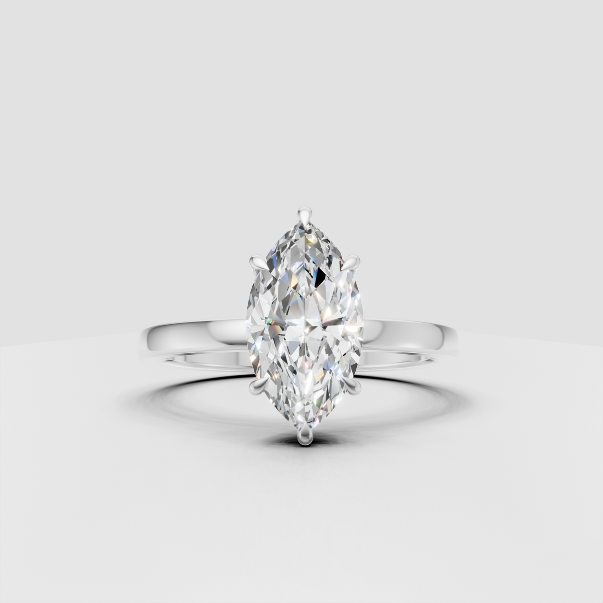 Classic six-prong marquise engagement ring with yellow gold band