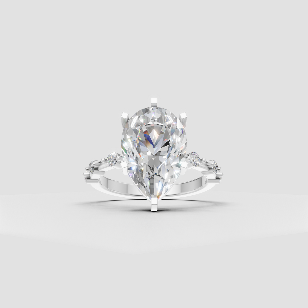 Pear diamond engagement ring with prong setting