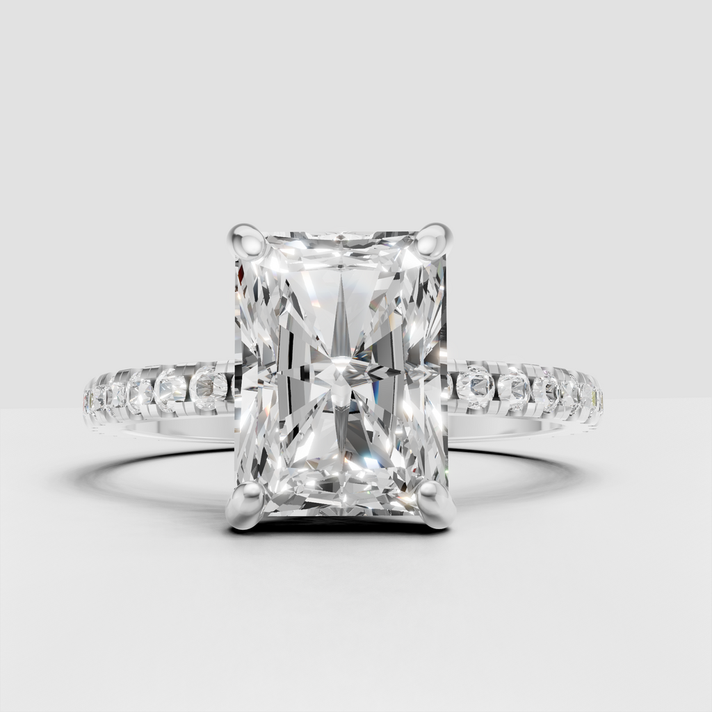 Elegant radiant cut engagement ring with four rounded prongs
