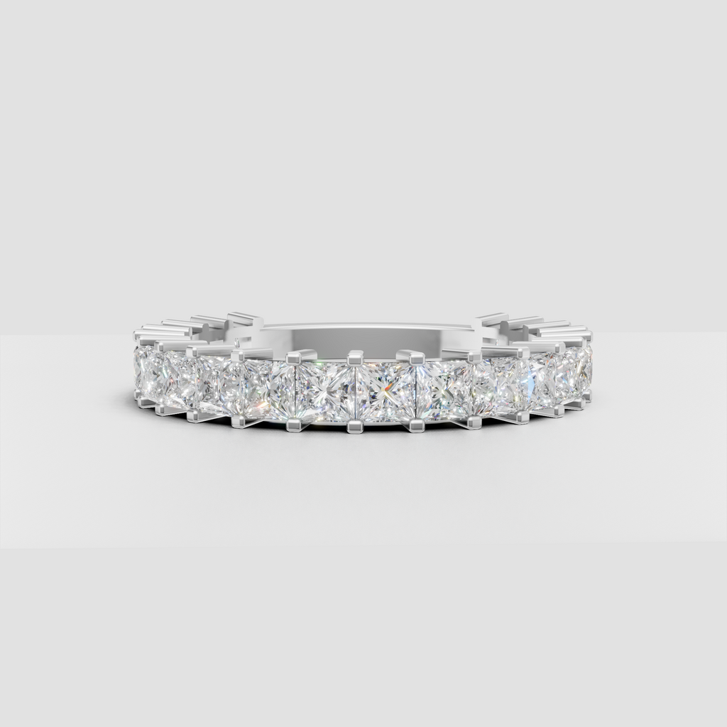 Cushion shaped diamond band with polished gold setting