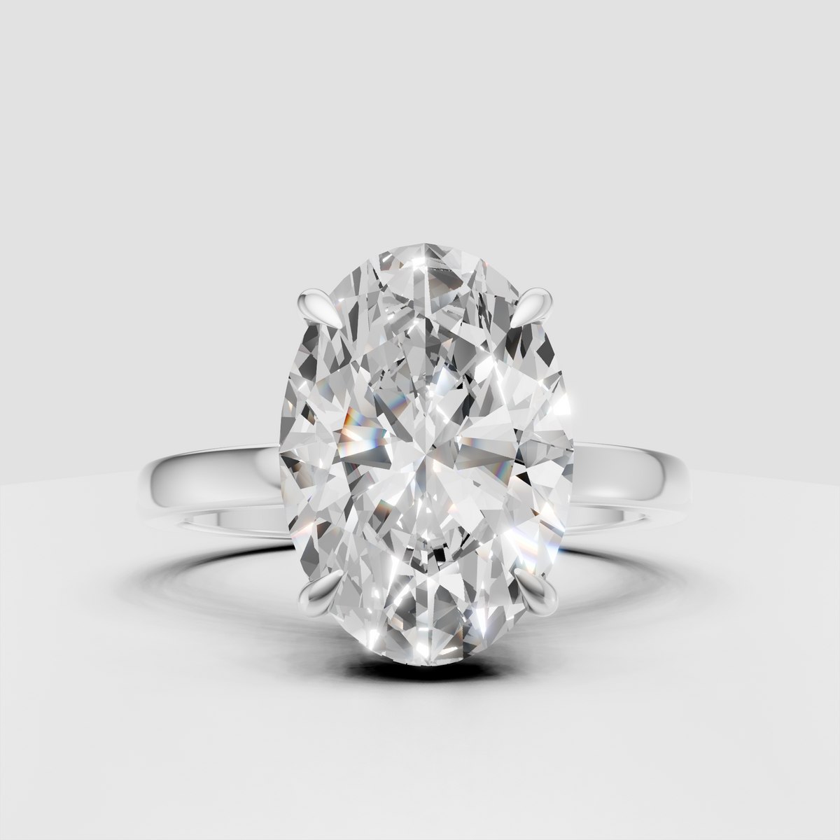 Oval cut diamond ring with polished gold band