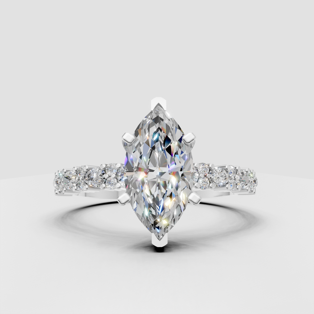Pear diamond ring with alternating marquise and round stones