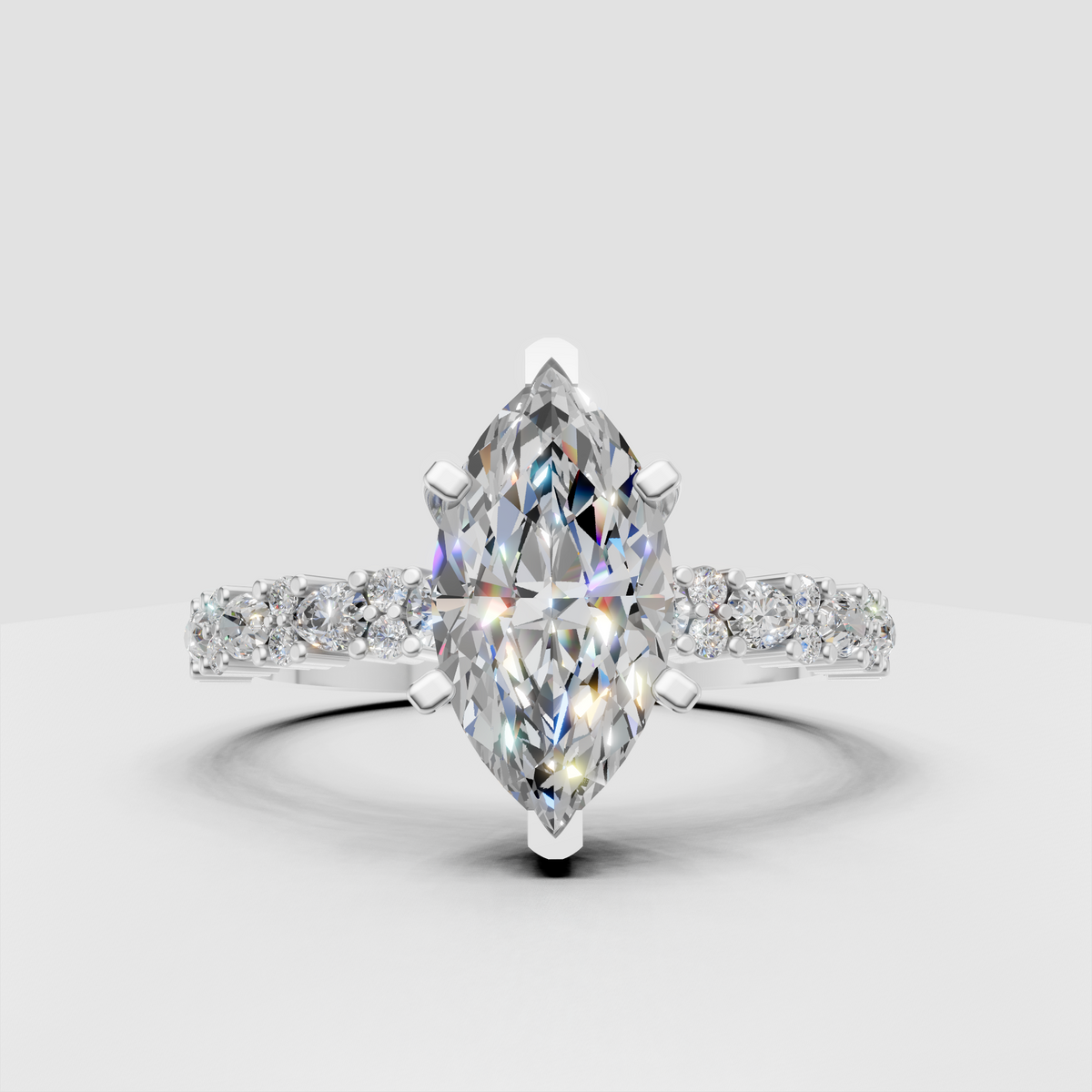 Pear diamond ring with alternating marquise and round stones