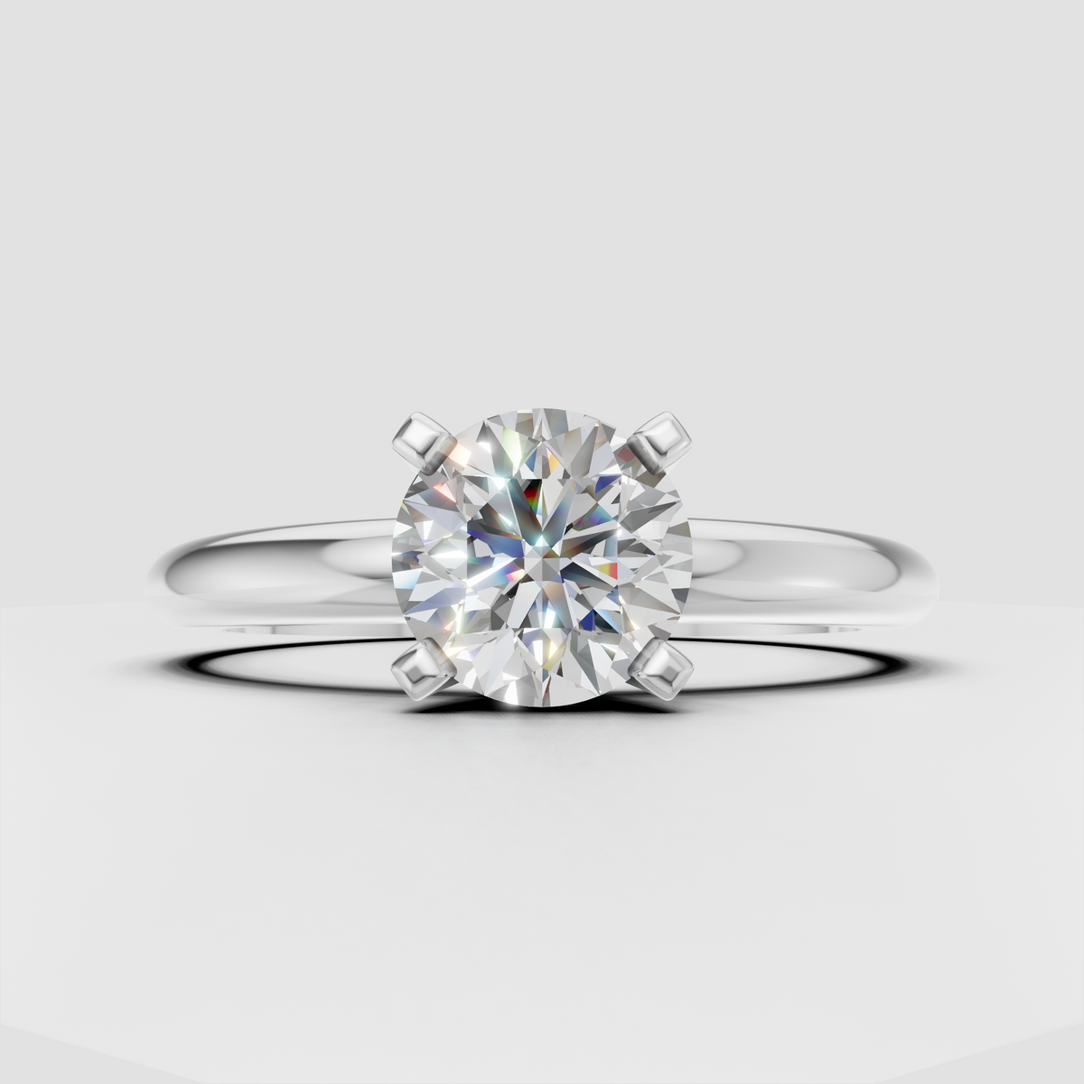Classic prong set round diamond engagement ring in yellow gold