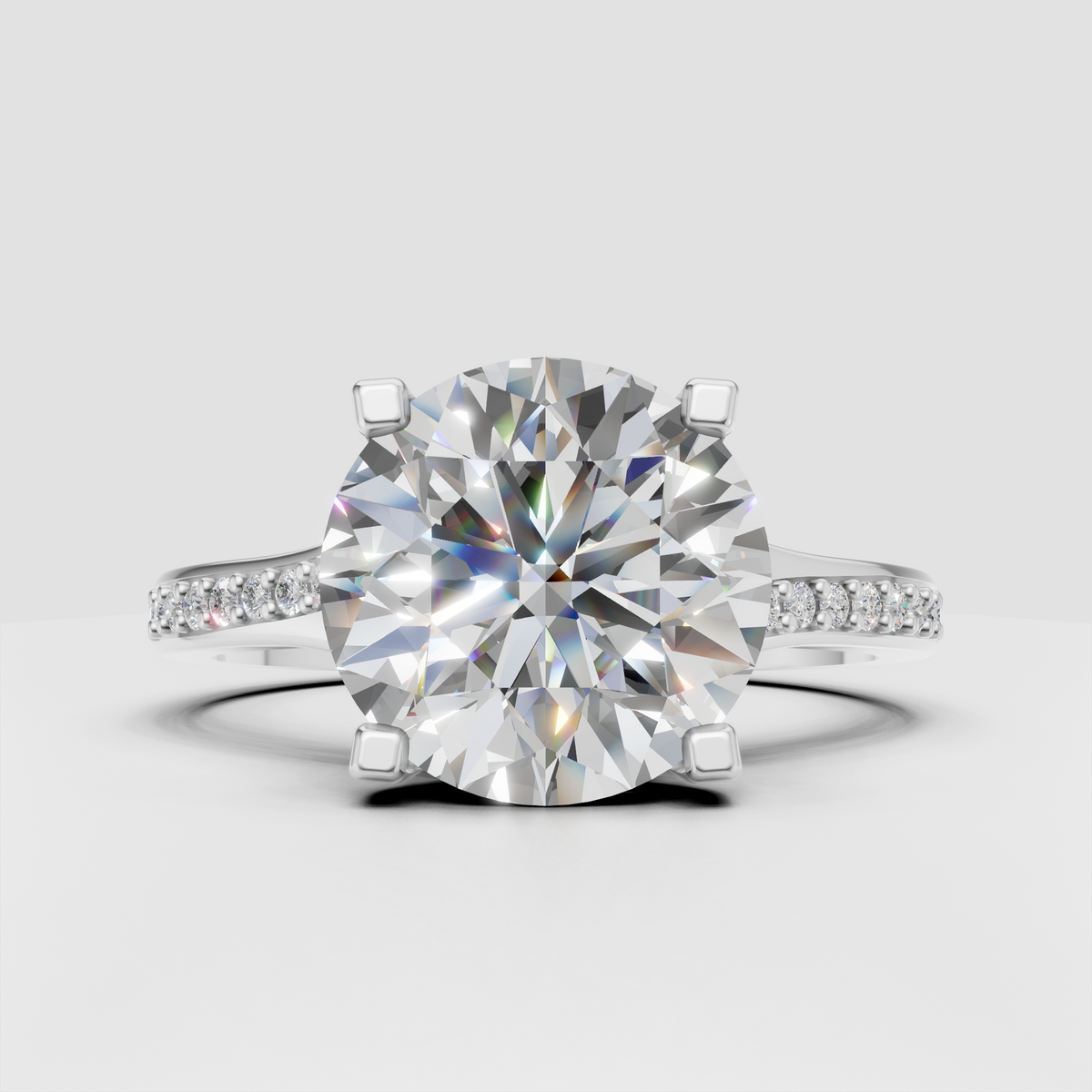 Pavé round diamond engagement ring in polished yellow gold
