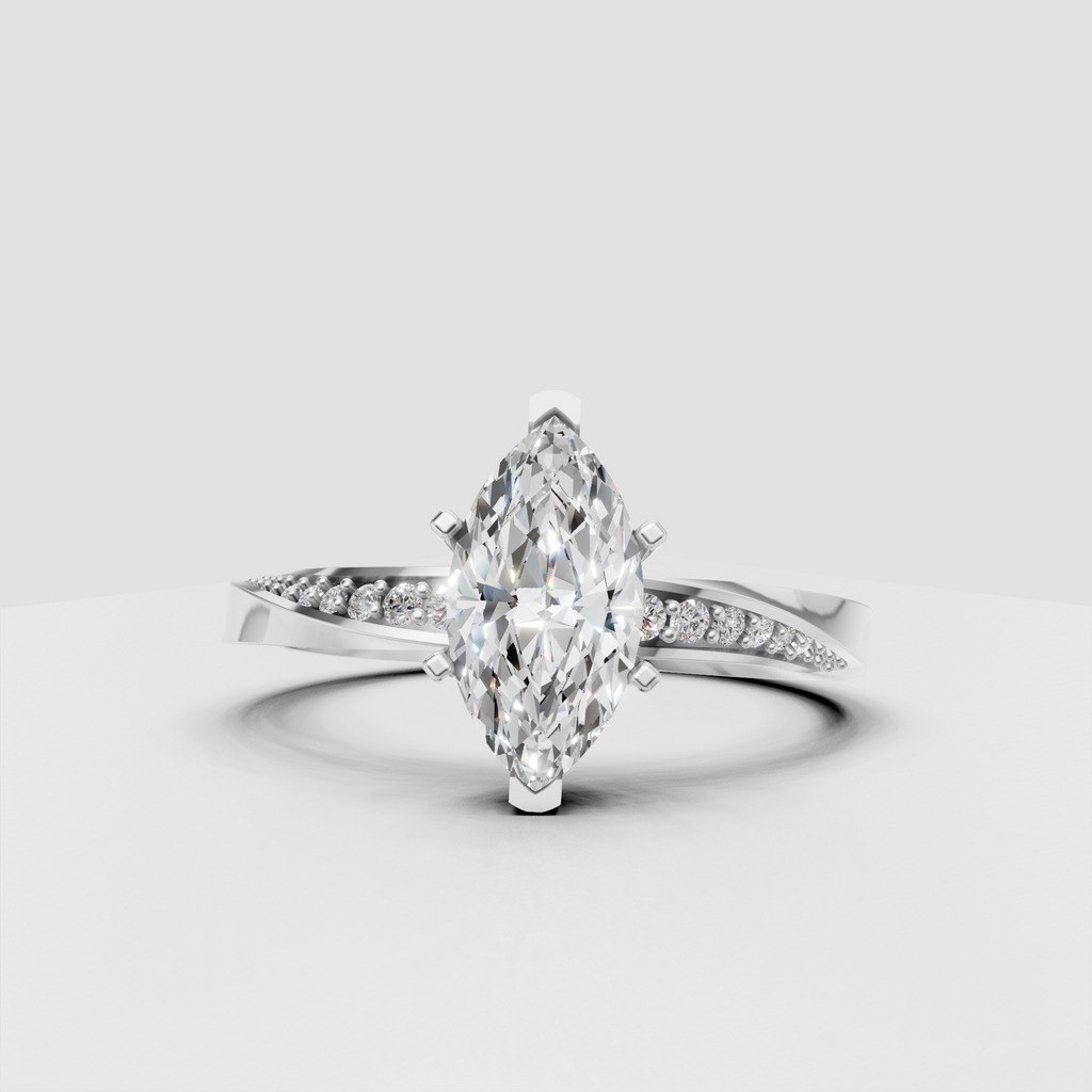 Marquise diamond ring featuring a tapered yellow gold band