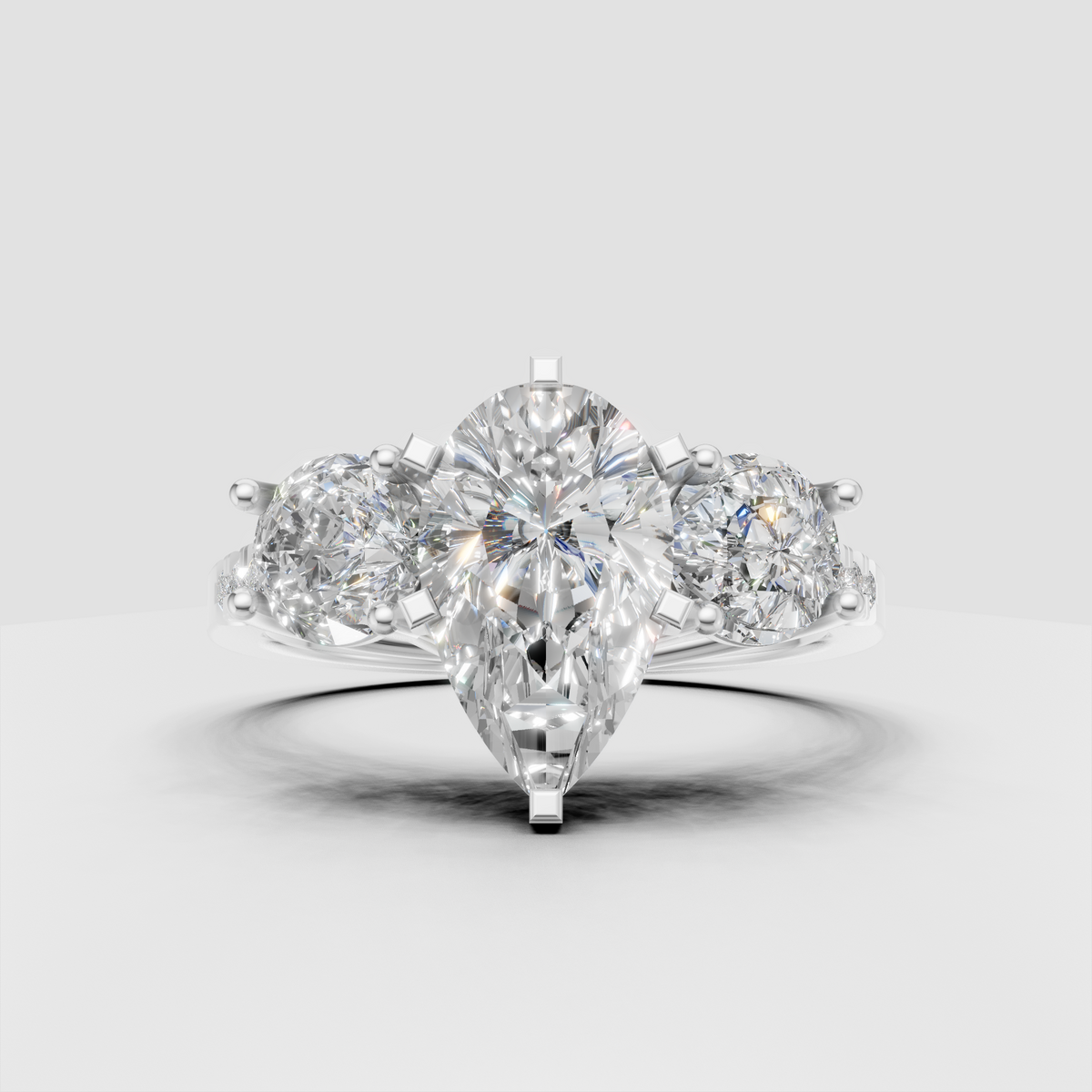 Yellow gold pear shape diamond engagement ring front view