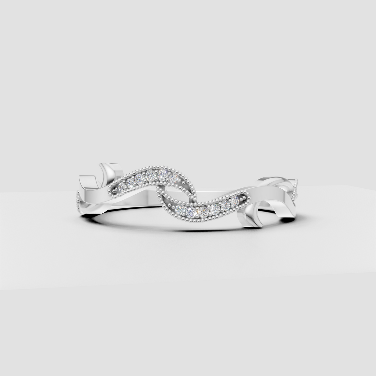 Sculptural infinity diamond ring with round stone accents