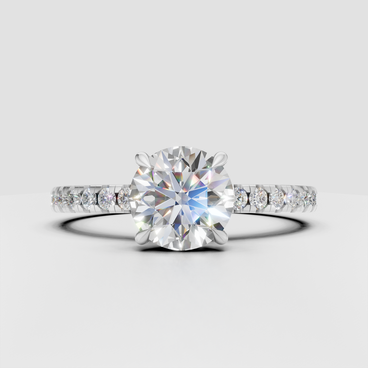 Elegant yellow gold solitaire engagement ring featuring a round brilliant center stone