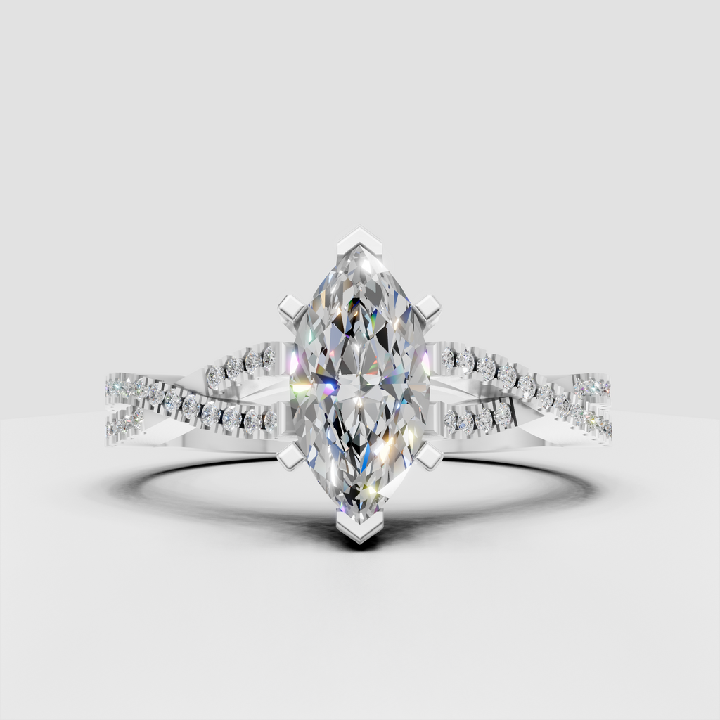 Close-up of marquise diamond cathedral engagement ring in yellow gold