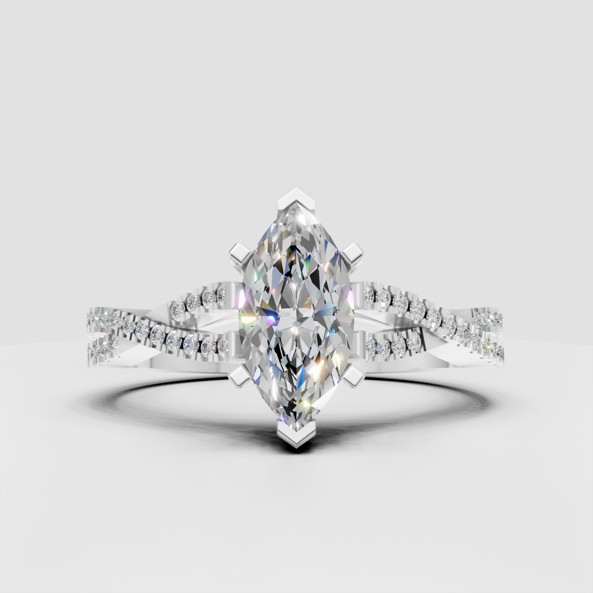 Close-up of marquise diamond cathedral engagement ring in yellow gold