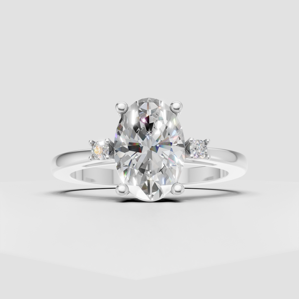 Oval diamond engagement ring featuring polished yellow gold band