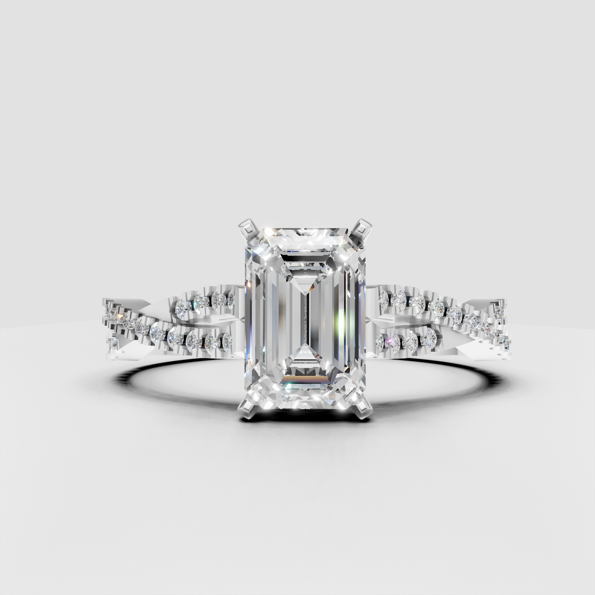 Emerald cut diamond ring with four prong cathedral setting