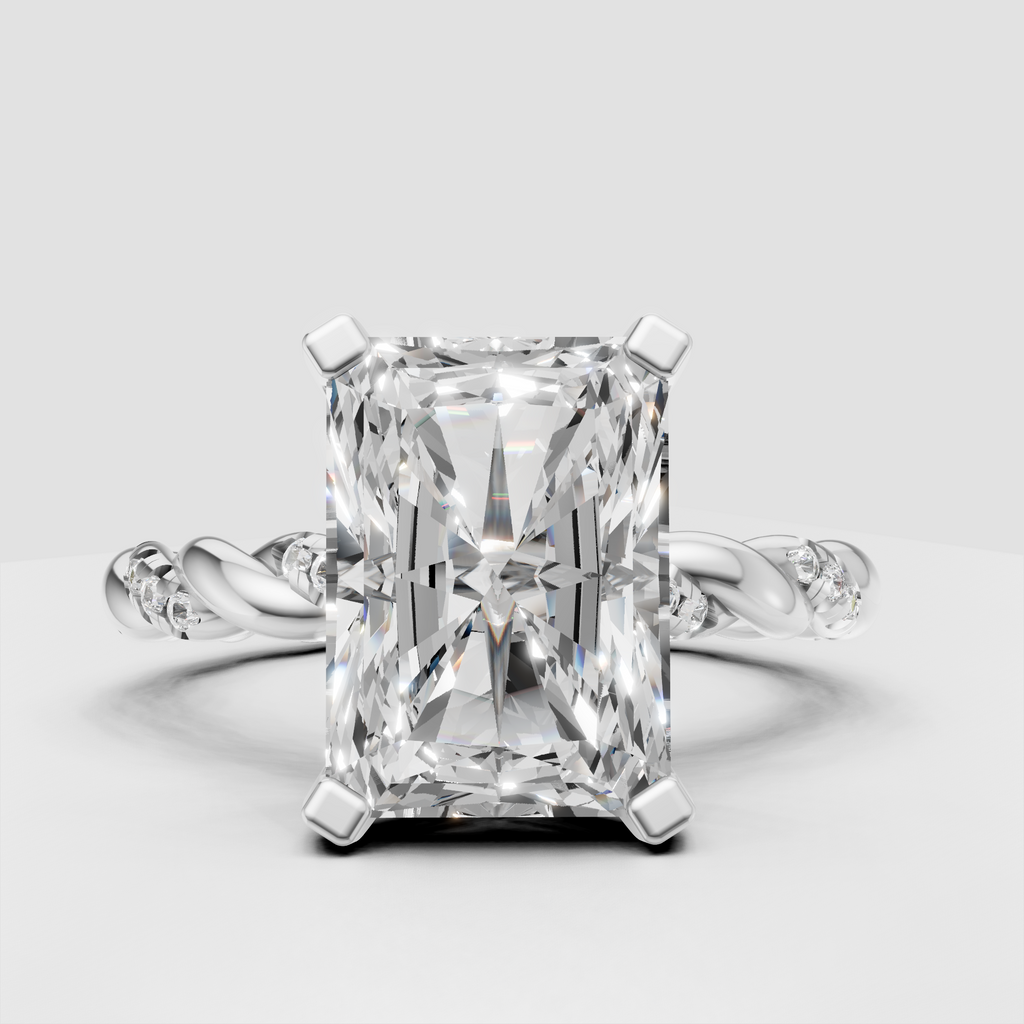 Twisted radiant cut diamond engagement ring with sparkling accents