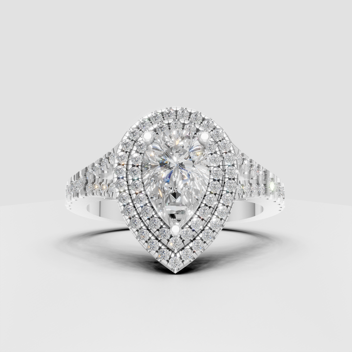 Pear-shaped center Diamond ring with double halo and split-shank pavé band