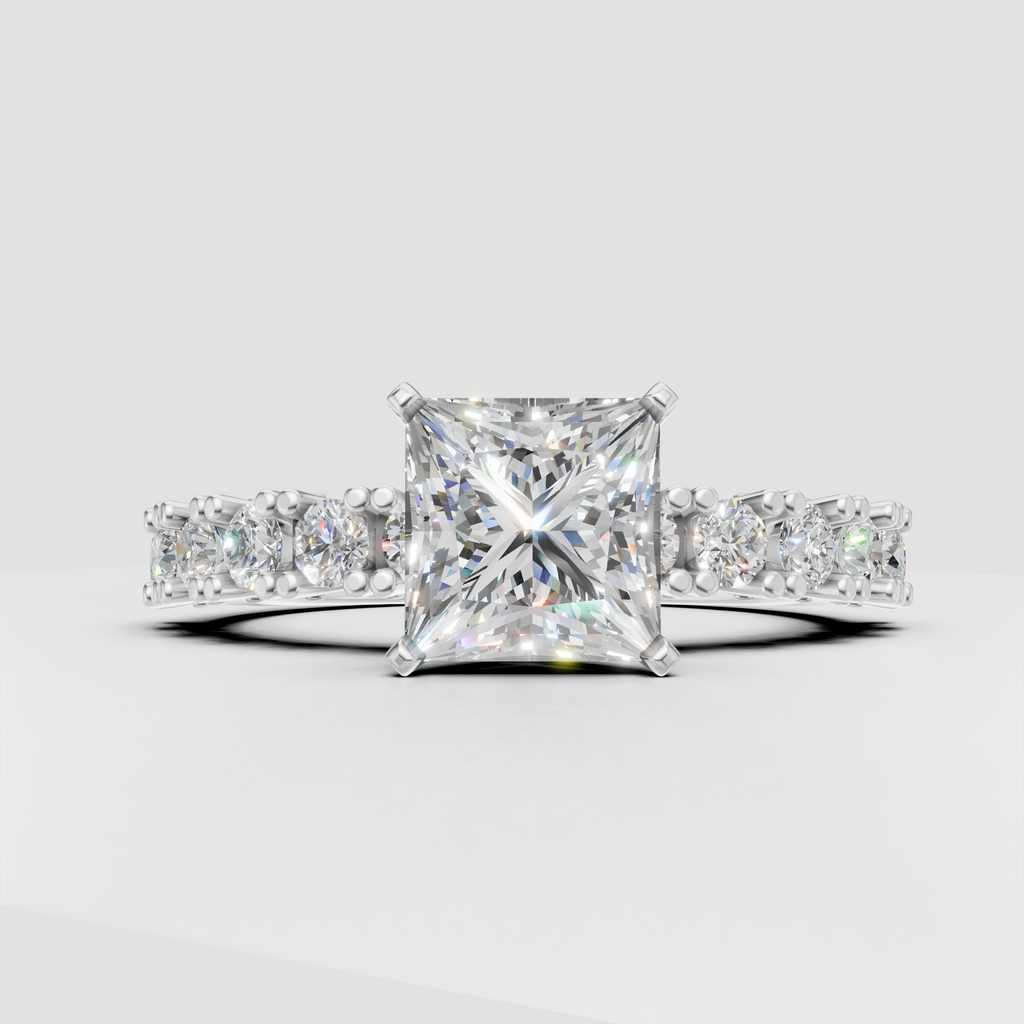 Four-prong princess cut diamond engagement ring with half-eternity side stones