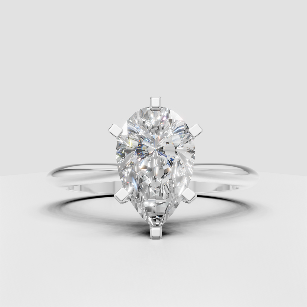 Close-up pear-shaped solitaire diamond ring in rose gold