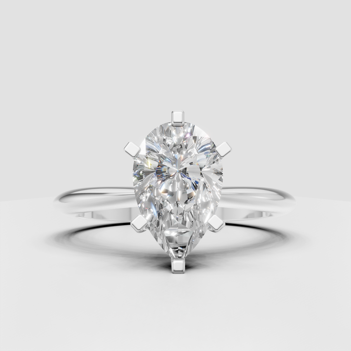 Close-up pear-shaped solitaire diamond ring in rose gold