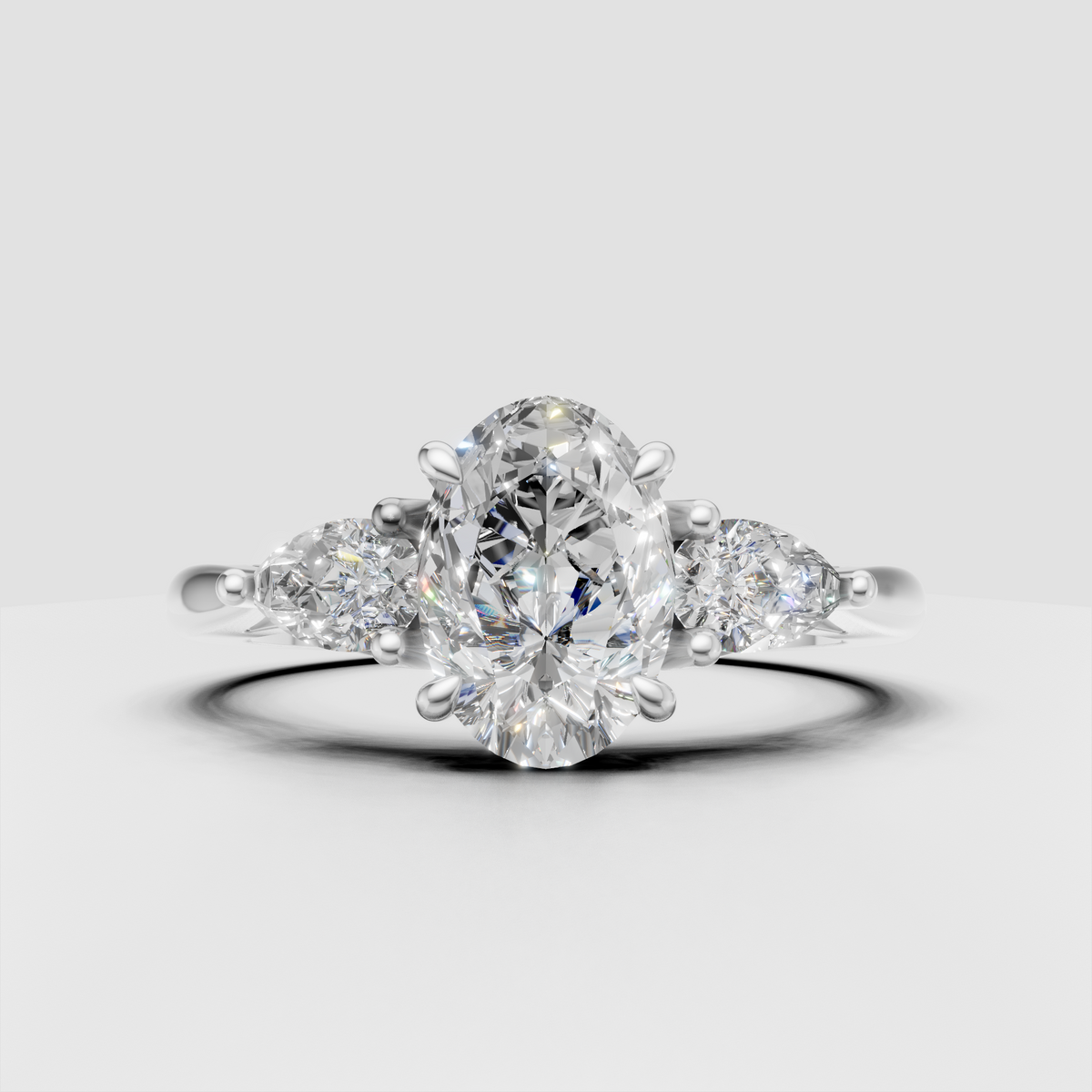 Elegant oval diamond three-stone ring with prong setting