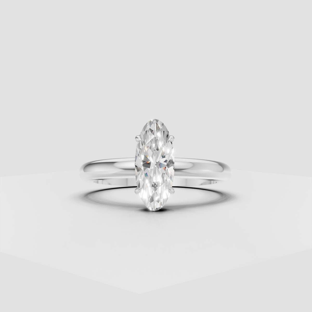 Classic oval diamond ring featuring a smooth rounded polished gold band