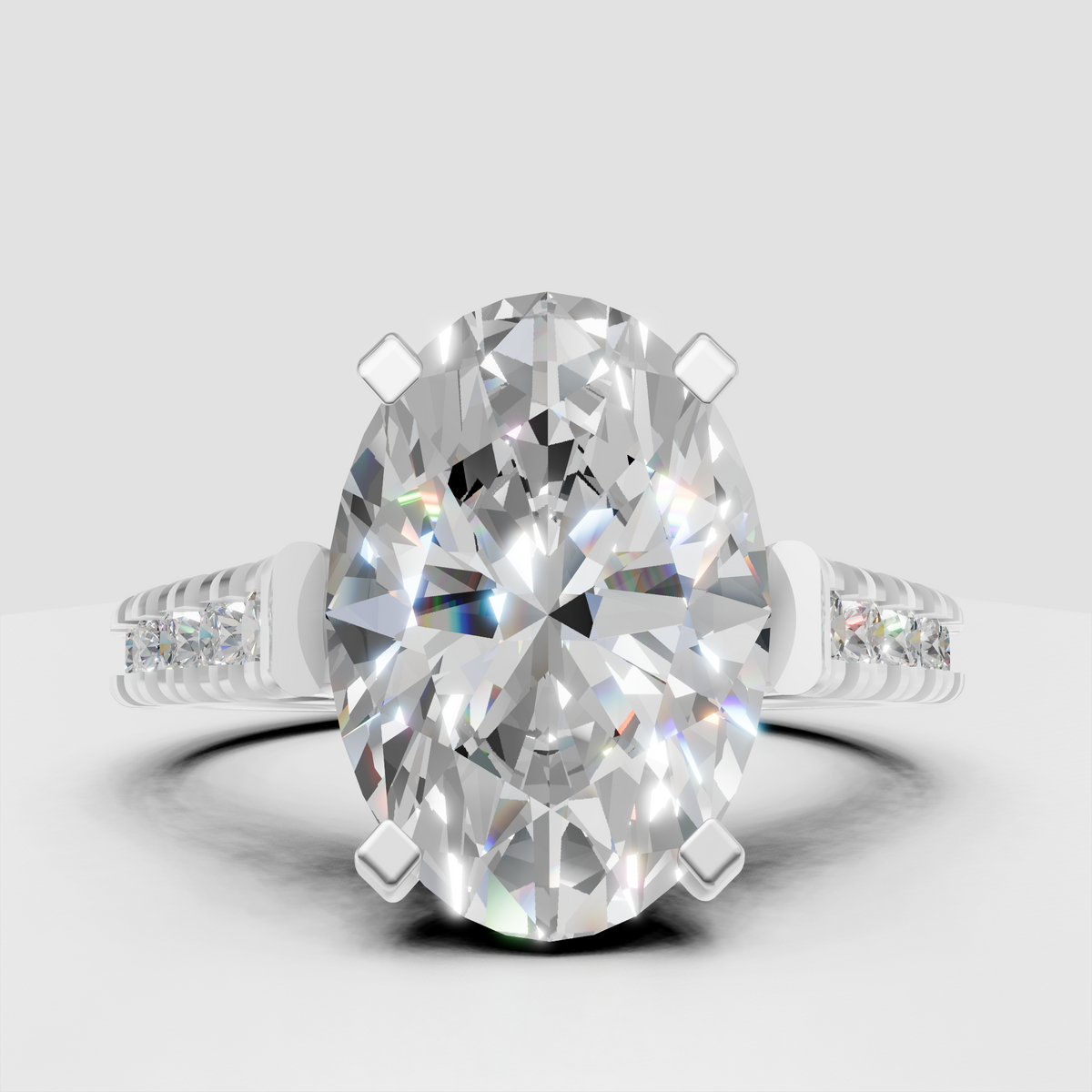 Four-prong oval diamond solitaire ring with detailed gallery