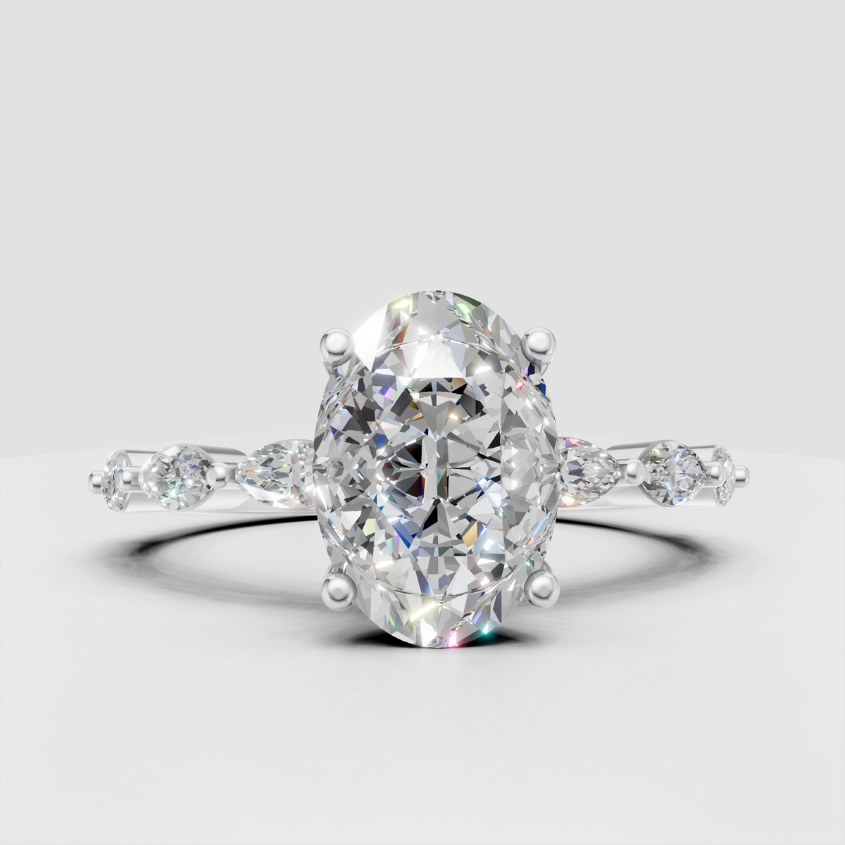Oval diamond ring with alternating round and marquise side stones