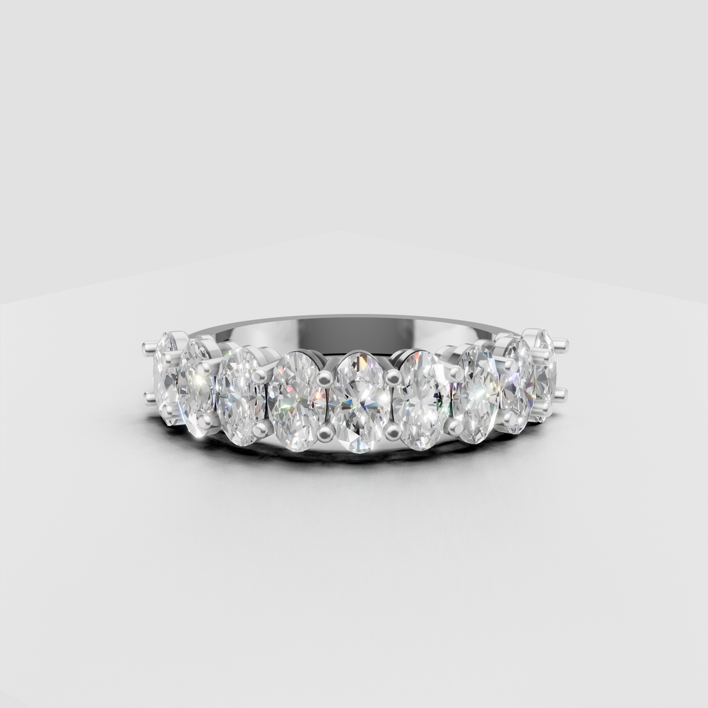 Elegant oval stone eternity band with secure individual prong settings