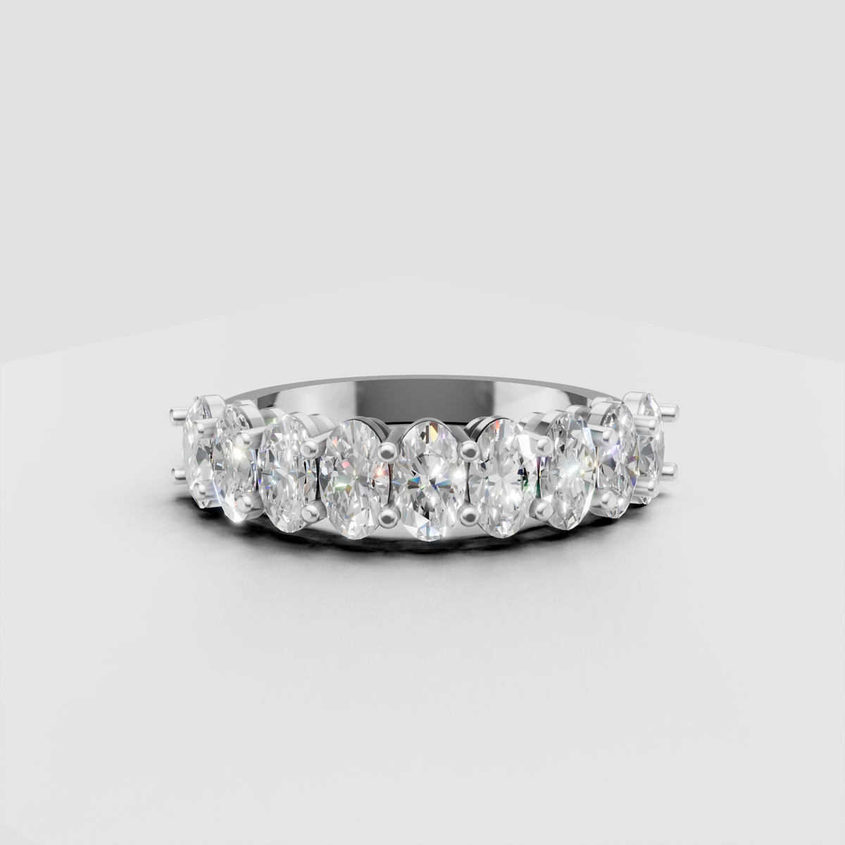 Elegant oval stone eternity band with secure individual prong settings