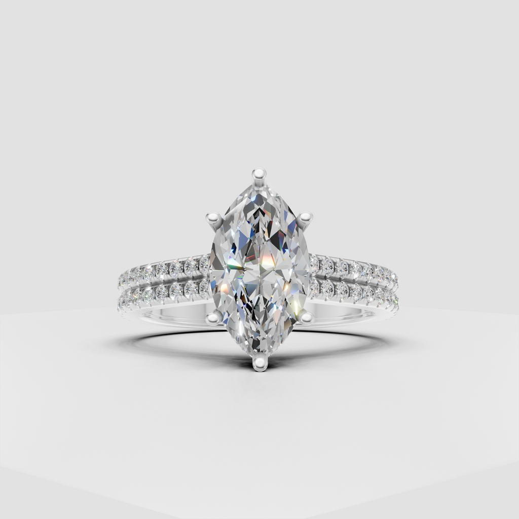 Elegant yellow gold marquise diamond ring with pavé side stones