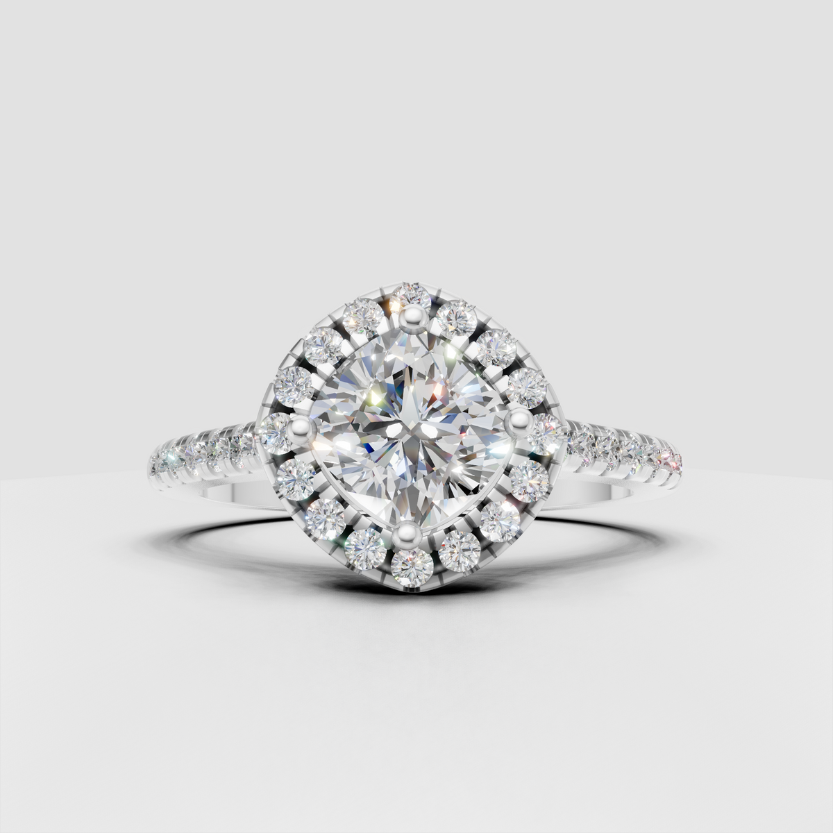 Luxury cushion diamond ring with brilliant halo and pavé shoulder stones