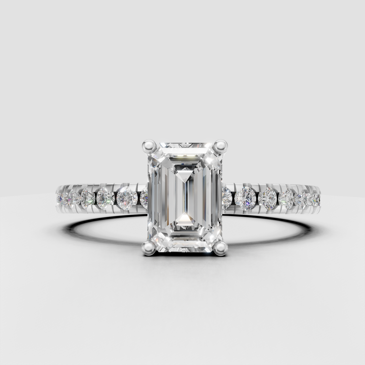 Luxury emerald cut engagement ring with raised four-prong canter setting