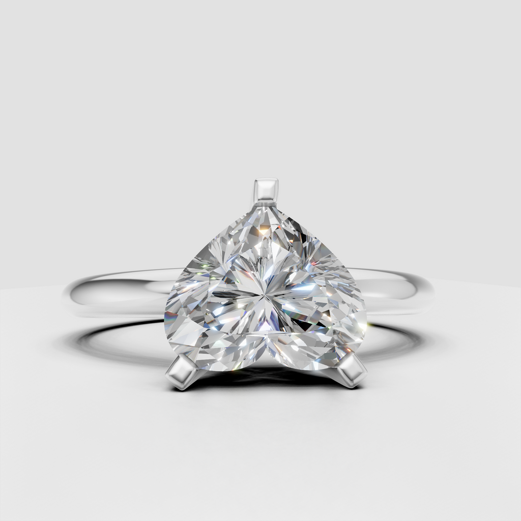 Elegant heart cut diamond ring with distinctive three prong setting