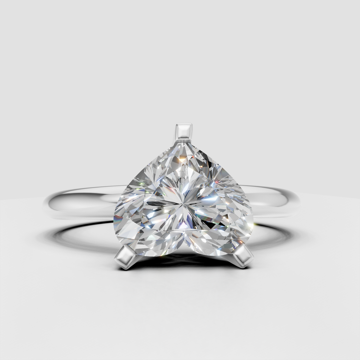 Elegant heart cut diamond ring with distinctive three prong setting