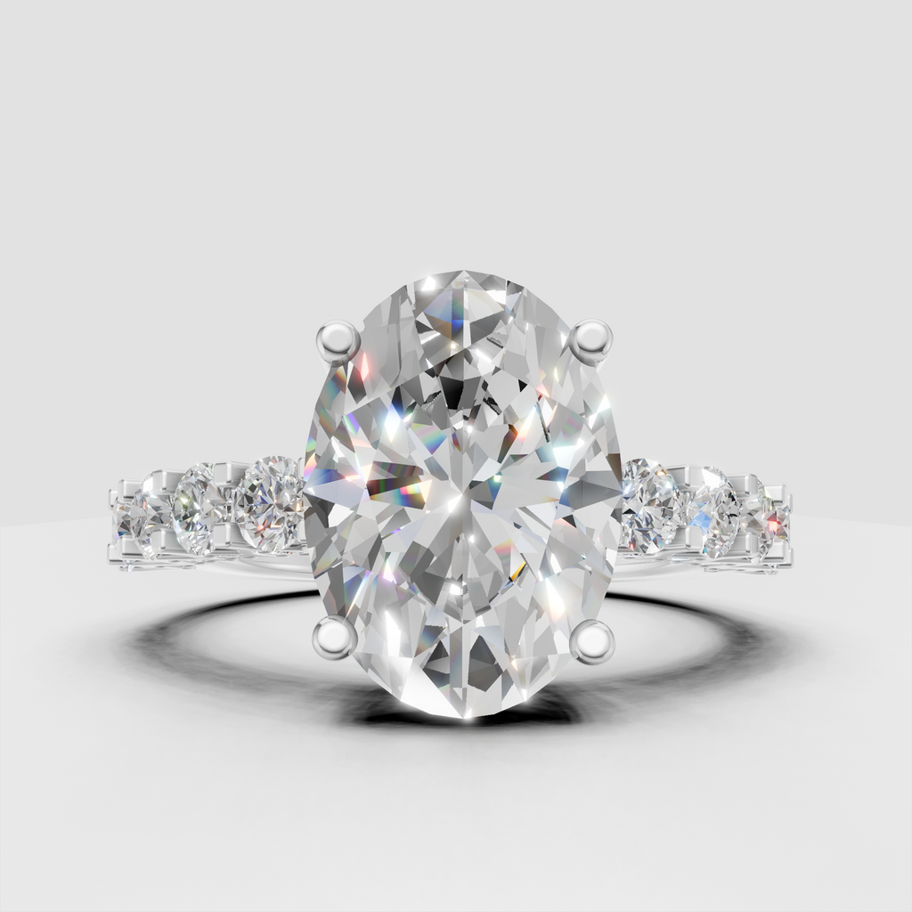 Floral pear diamond engagement ring with sculptural gold setting
