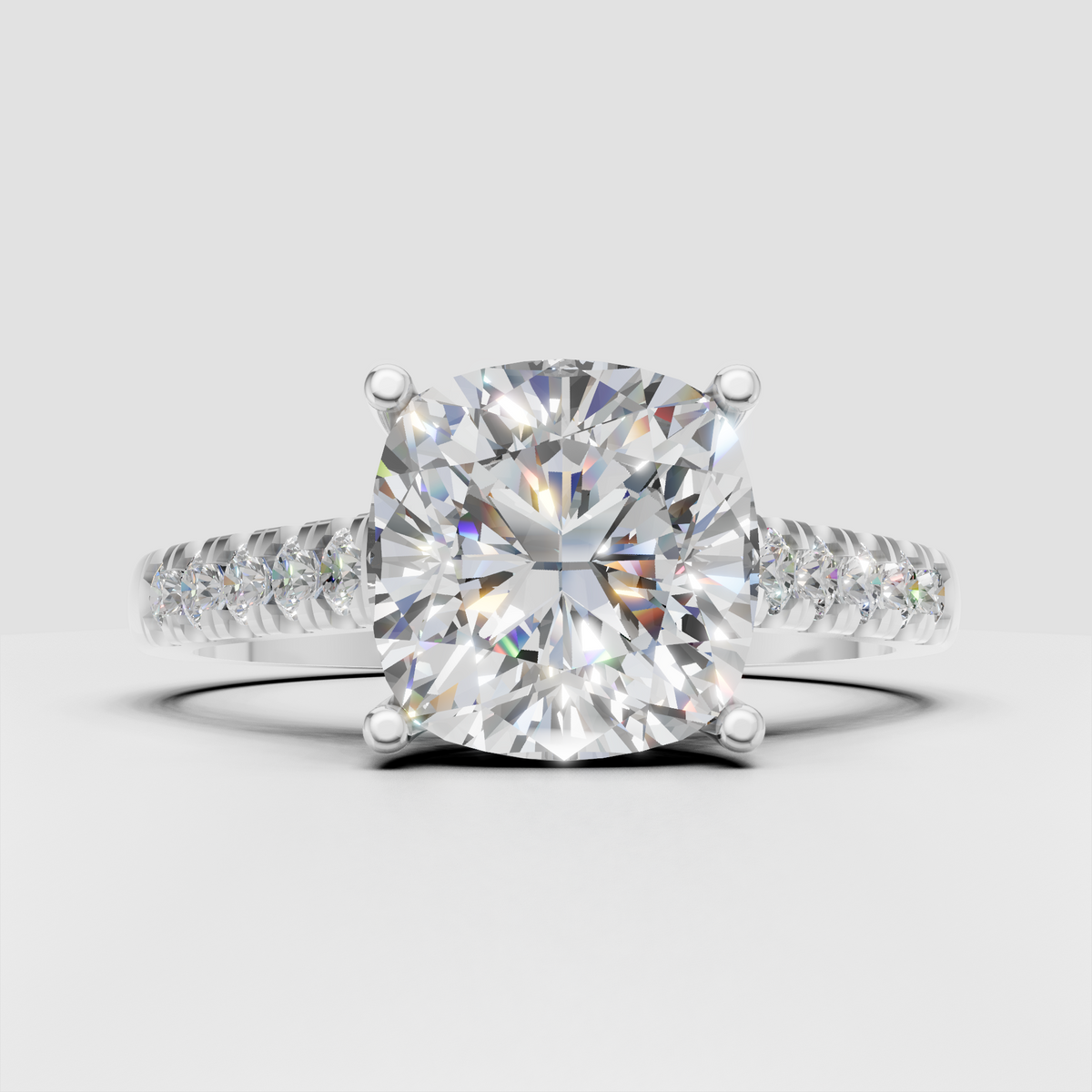 Elegant cushion cut engagement ring in polished yellow gold