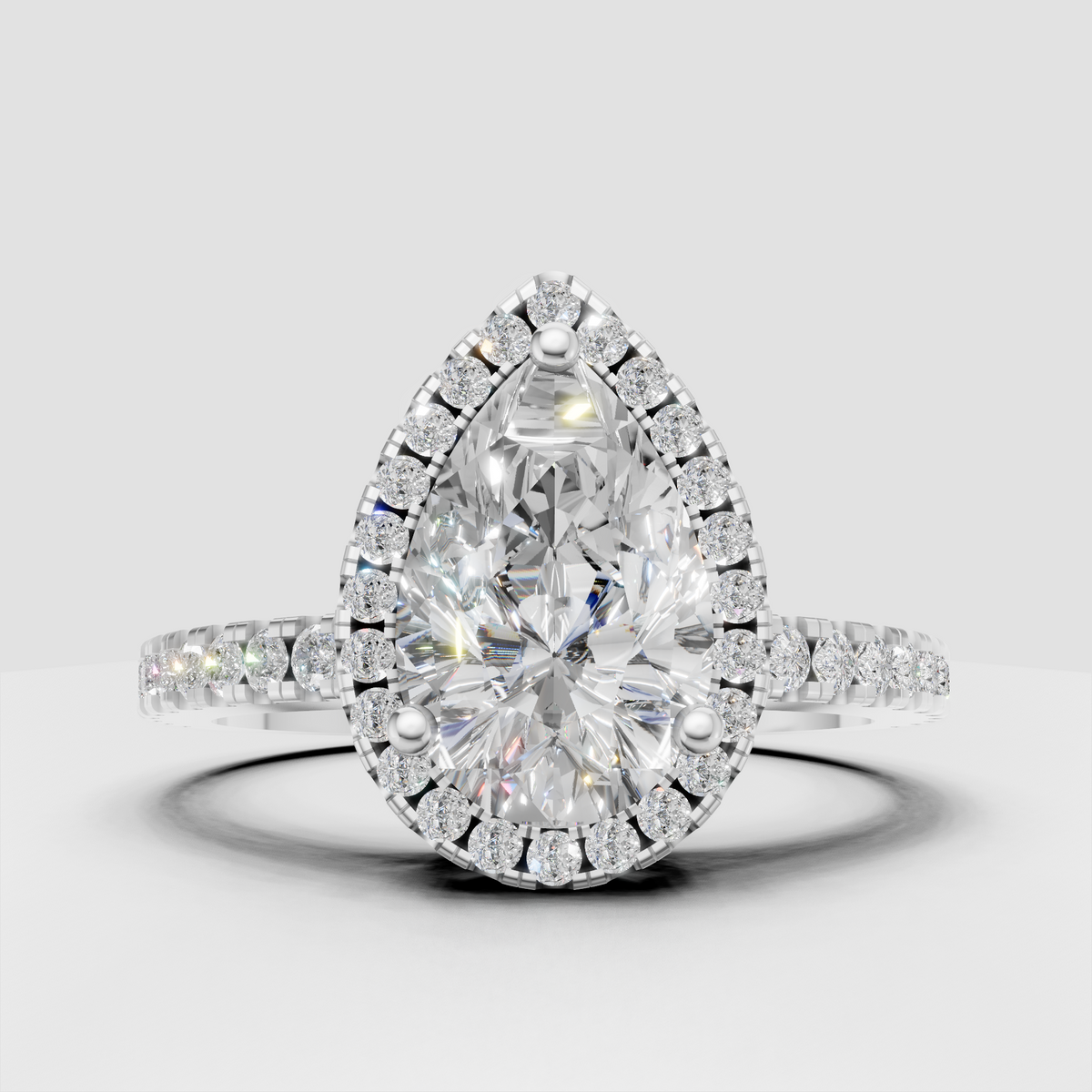 Elegant pear diamond engagement ring with full round diamond halo