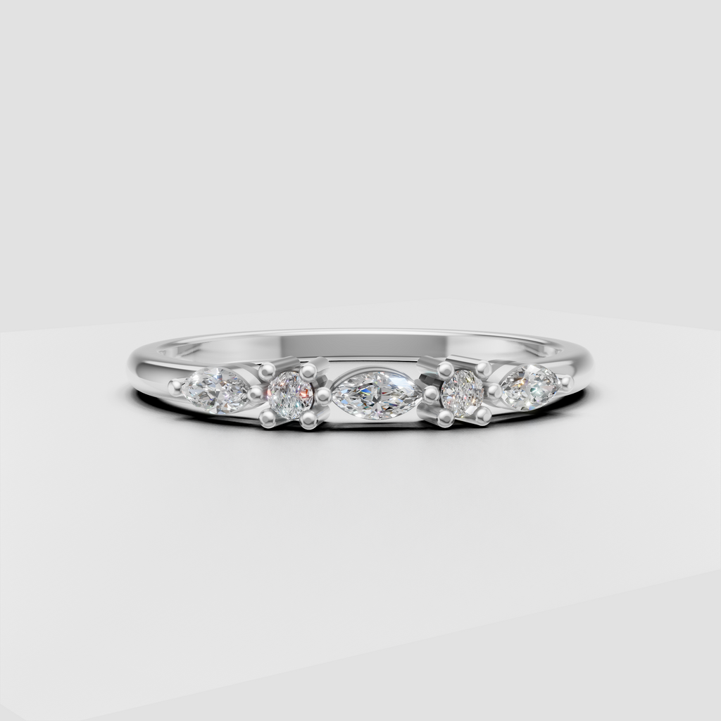 Side view of round and marquise diamond wedding band with open gallery
