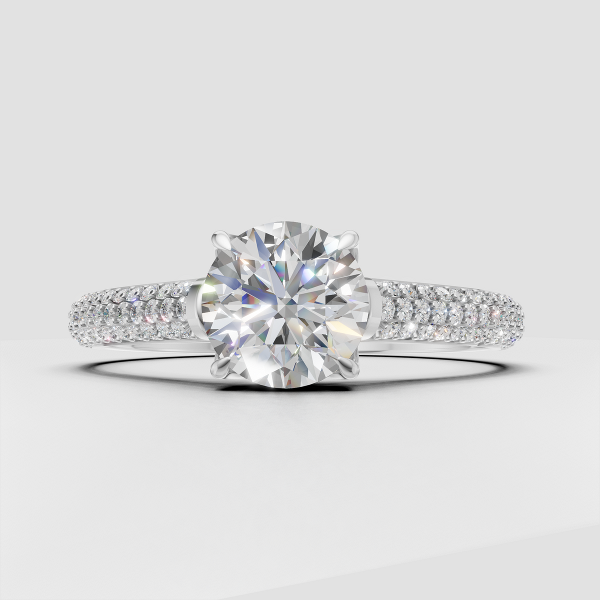 Cathedral round Diamond engagement ring with pavé shoulders