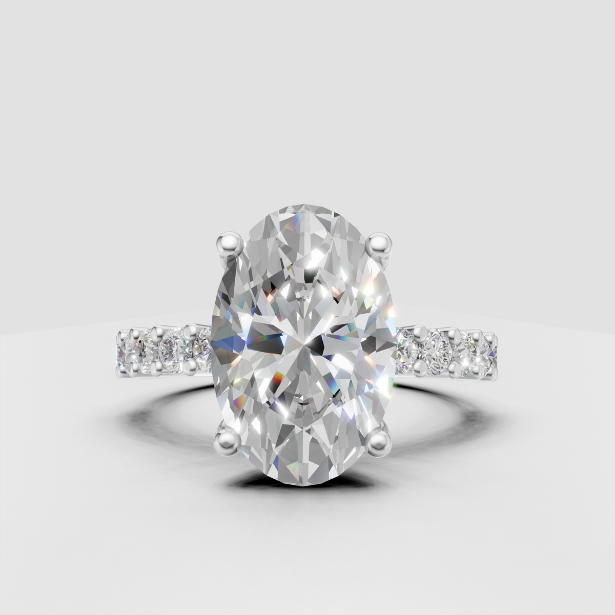 Oval diamond ring featuring a polished yellow gold band