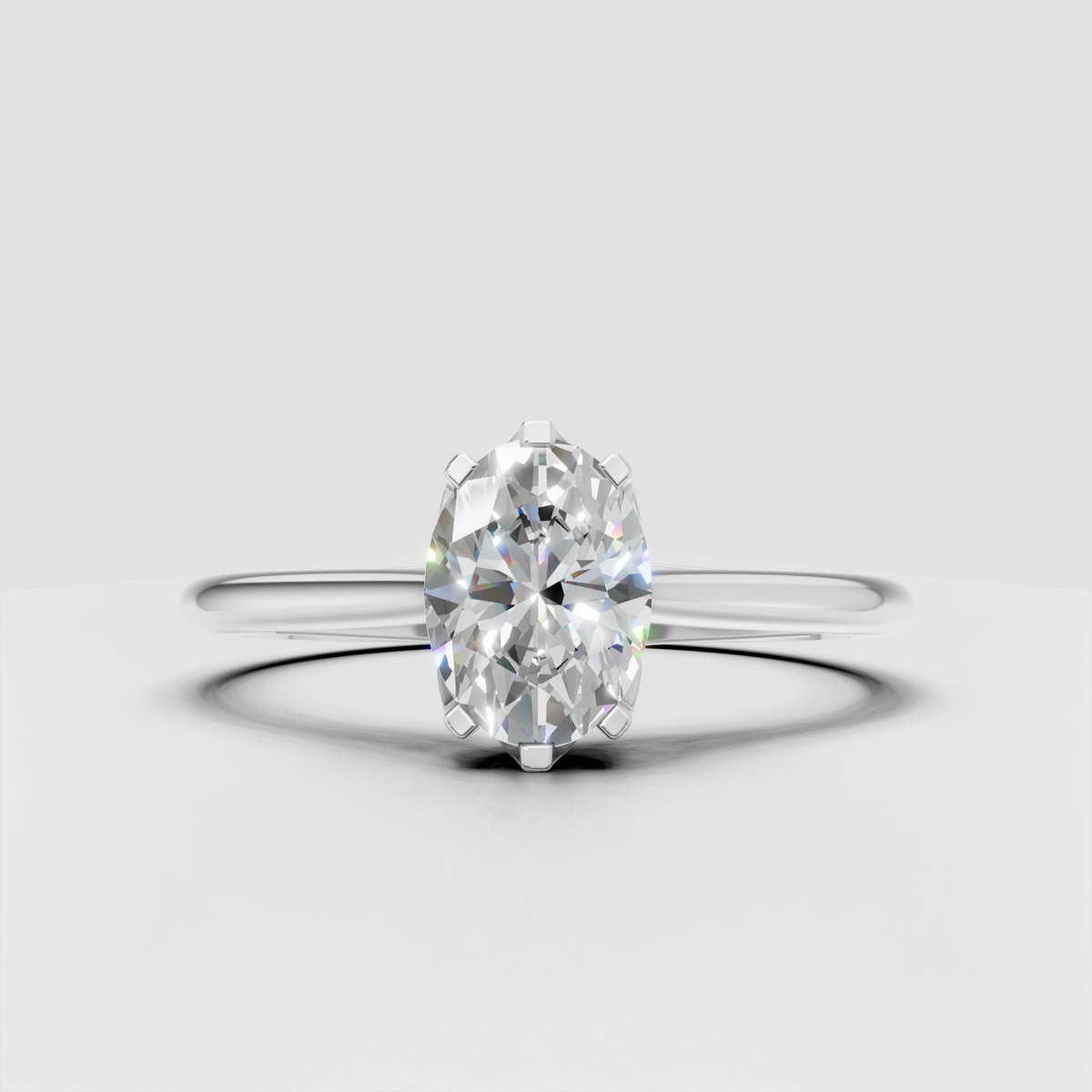 Classic oval solitaire engagement ring in polished yellow gold