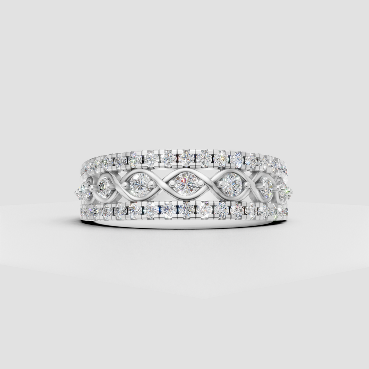 Three row diamond ring with infinity inspired crossover detailing