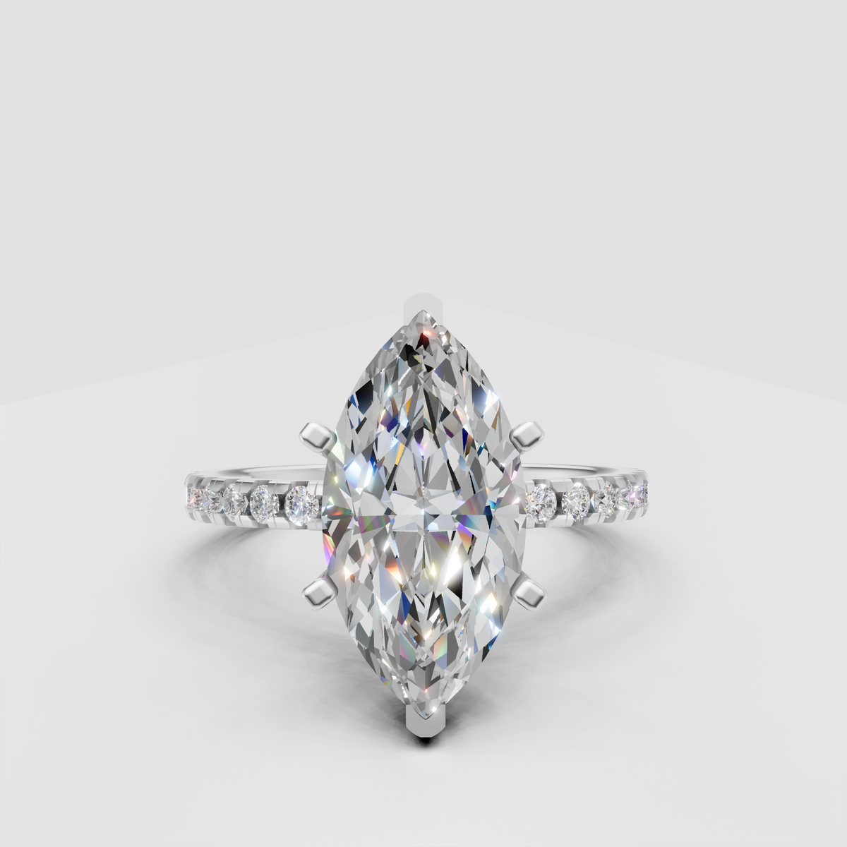 Marquise canter stone ring with round accent diamonds