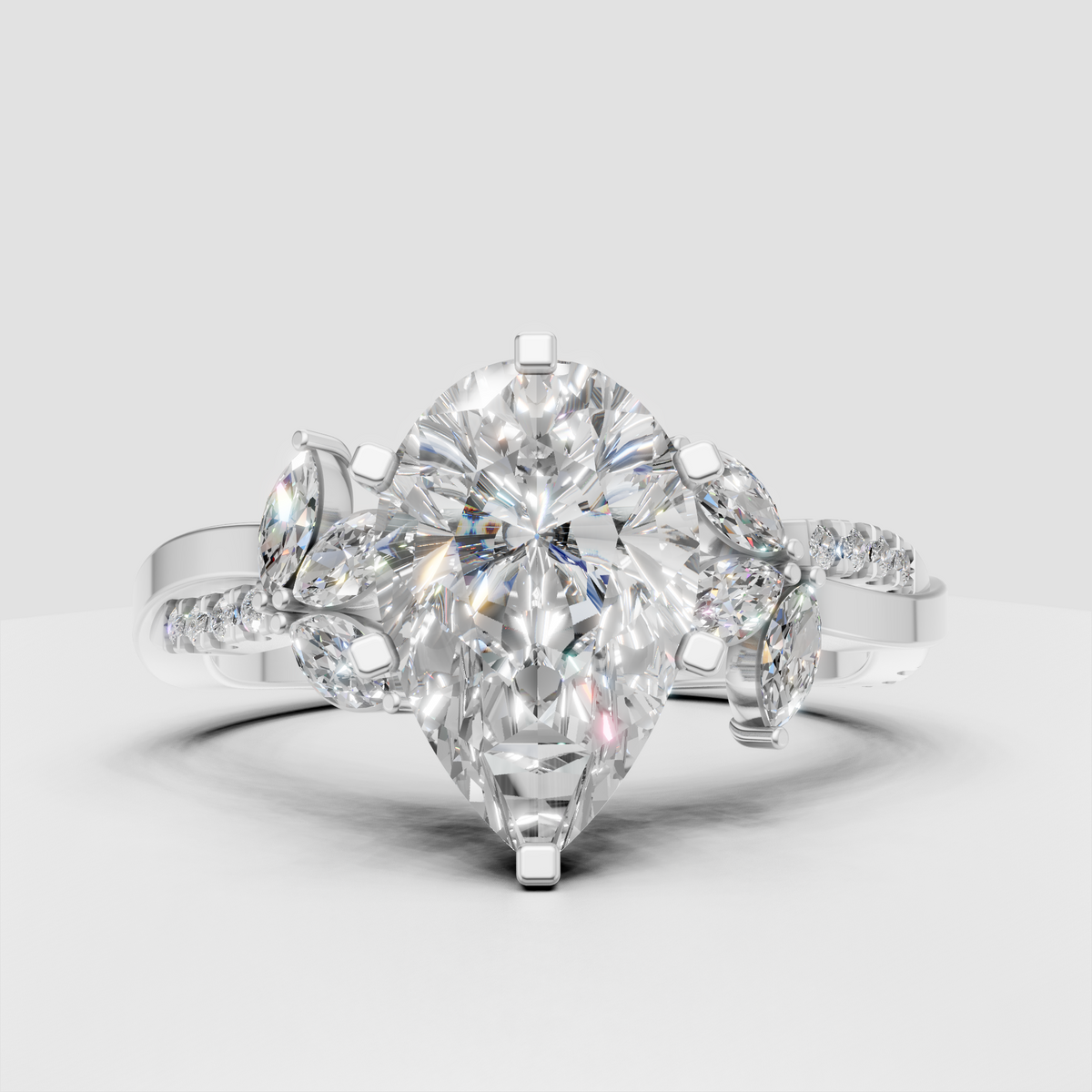 Pear diamond ring with floral marquise stones and split shank