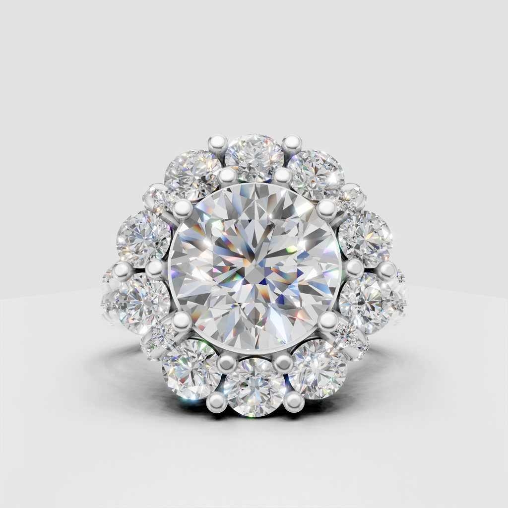 Ornate yellow gold halo engagement ring with pavé shoulders