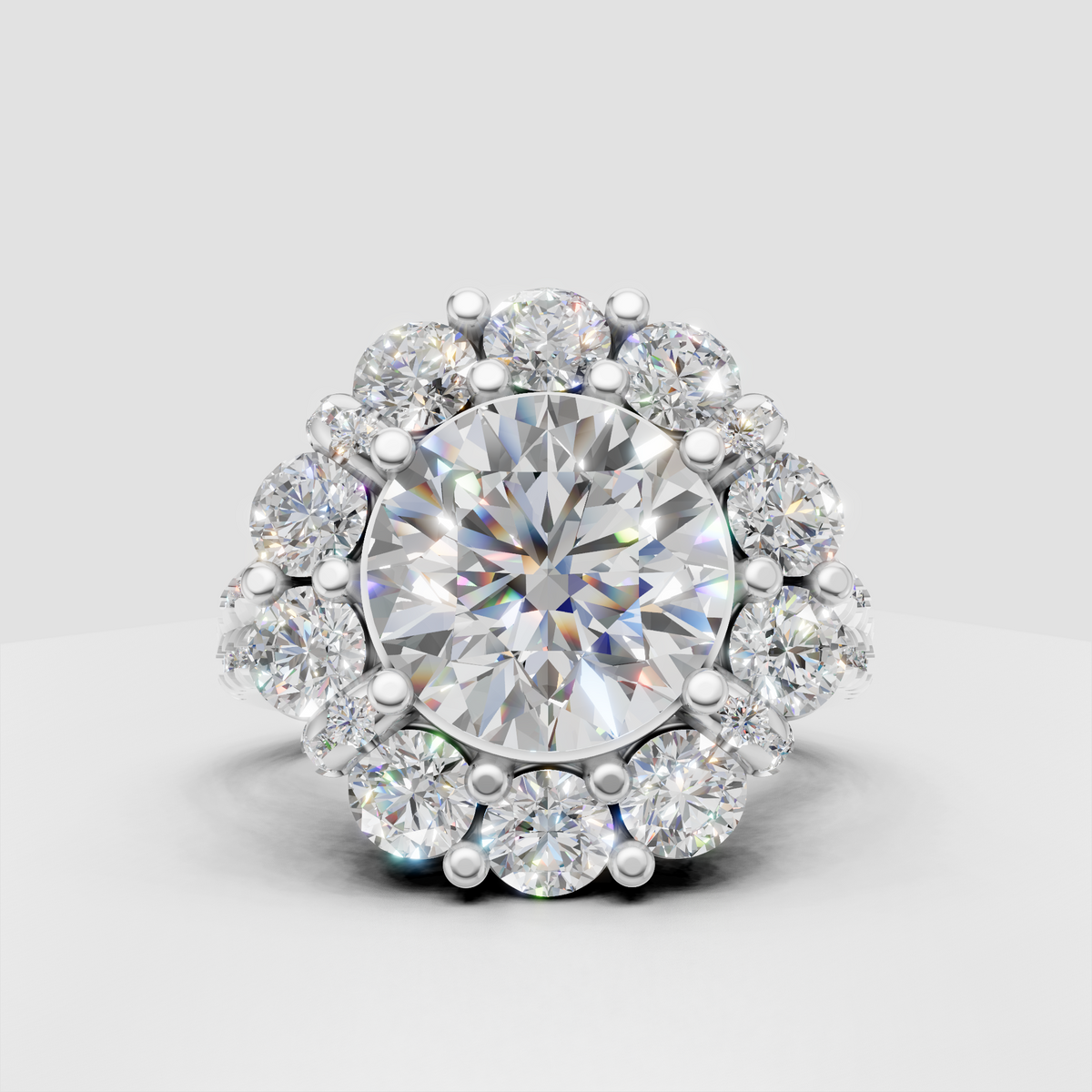Ornate yellow gold halo engagement ring with pavé shoulders