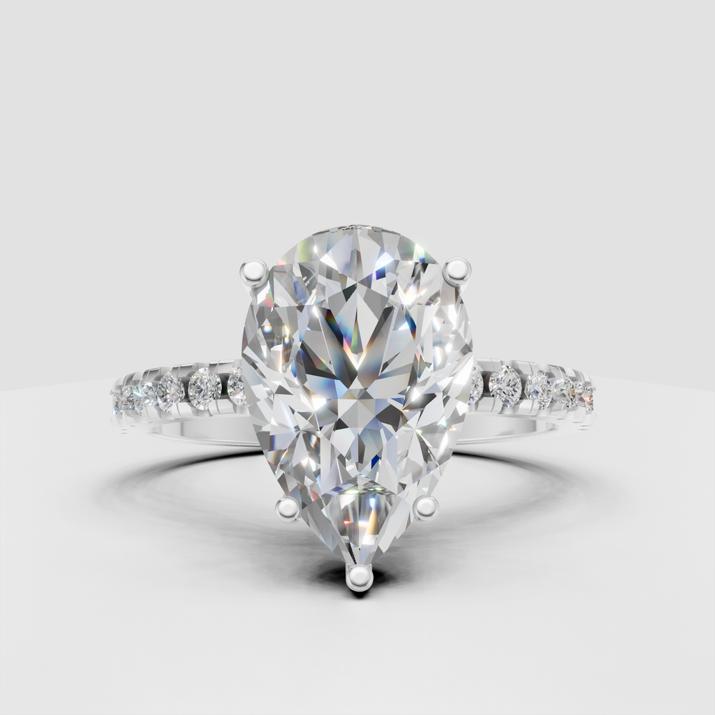 Luxury yellow gold pear Diamond engagement ring with sparkling pavé accents