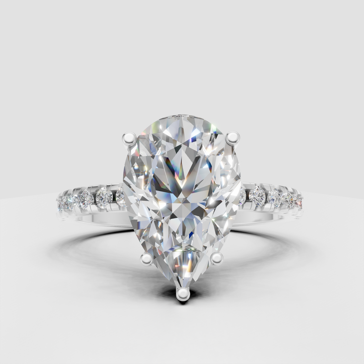 Luxury yellow gold pear Diamond engagement ring with sparkling pavé accents
