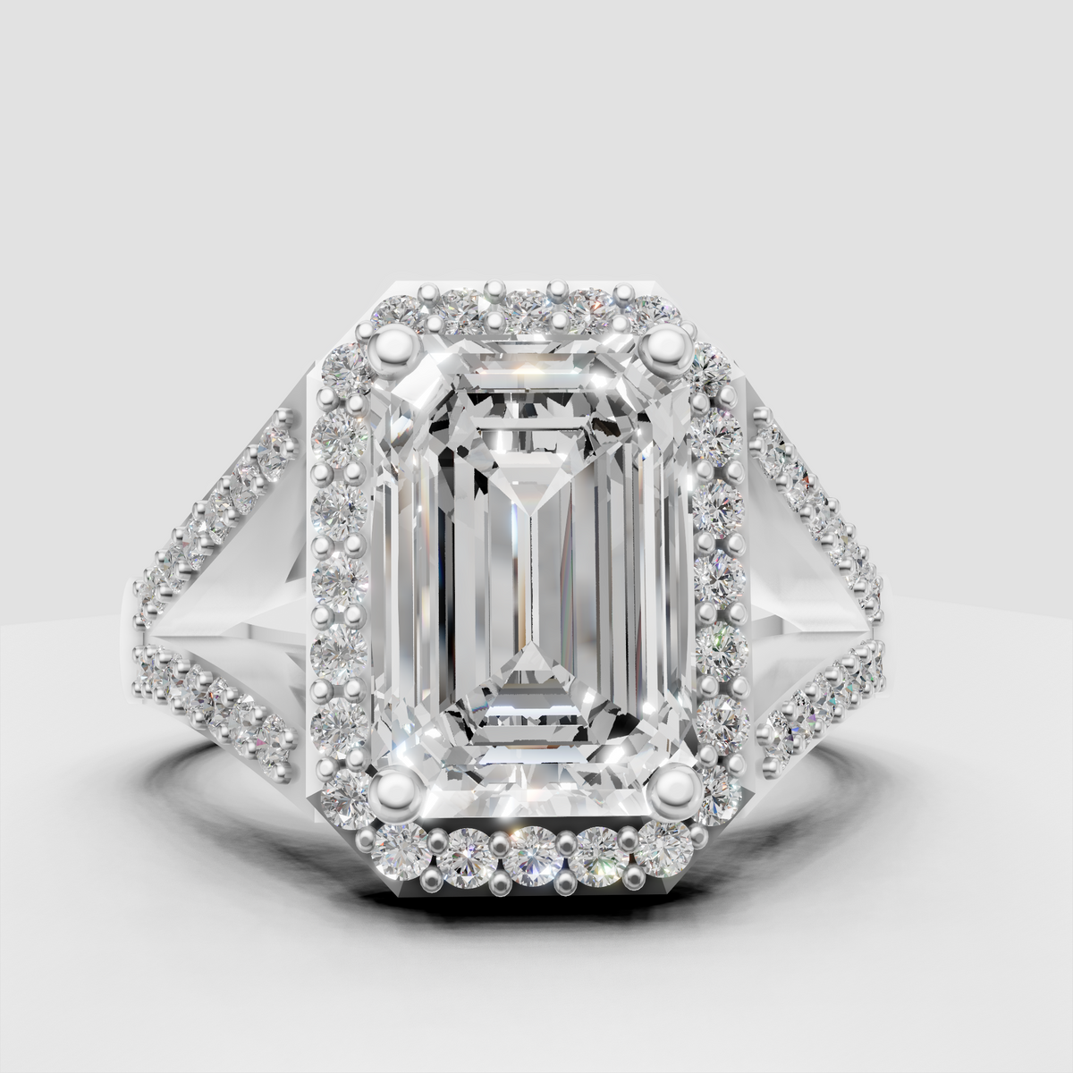 Yellow gold emerald halo engagement ring with diamond-lined band
