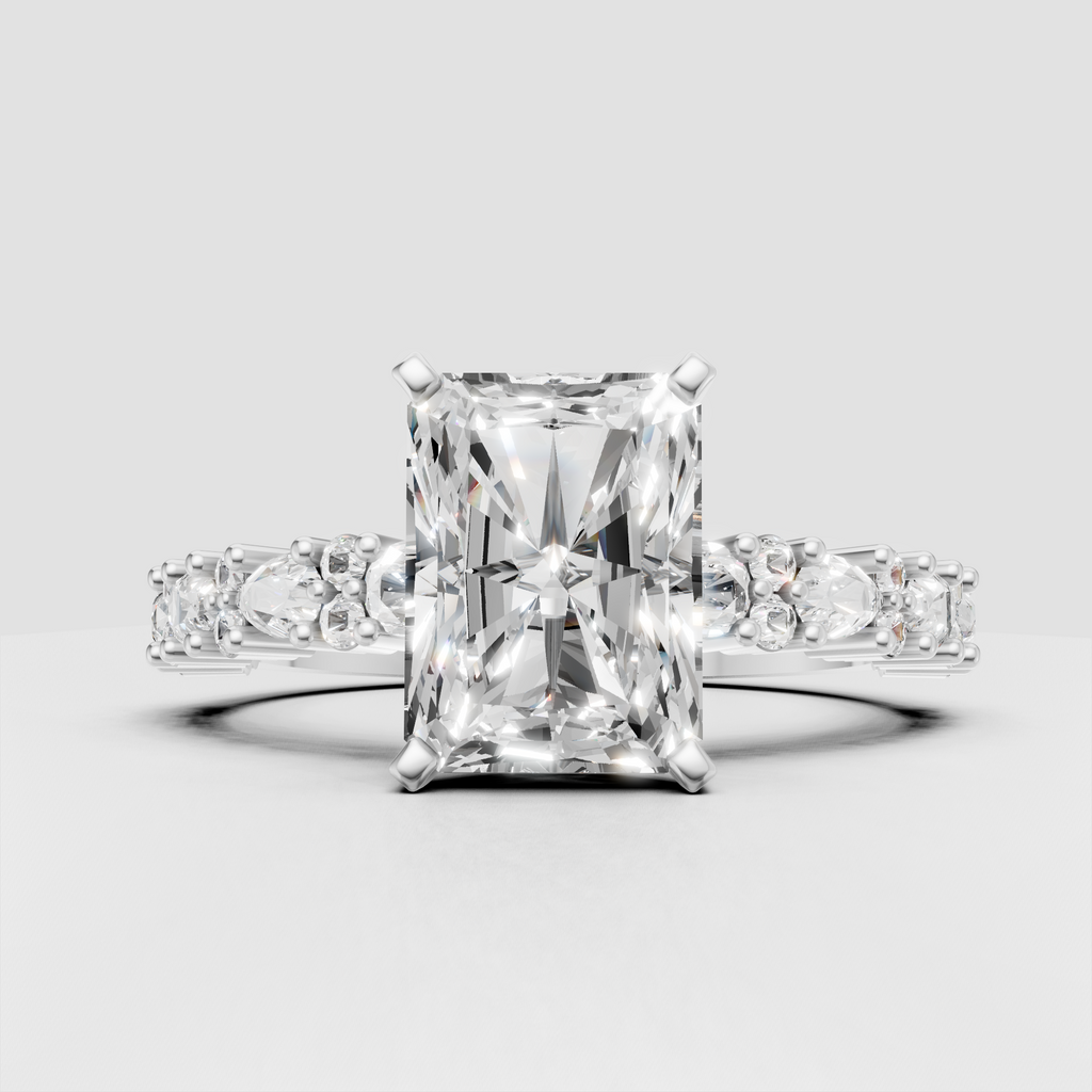 Radiant rectangular diamond ring with detailed side stones